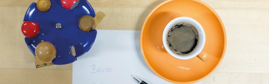 Grafik mit Tasse und Stempel